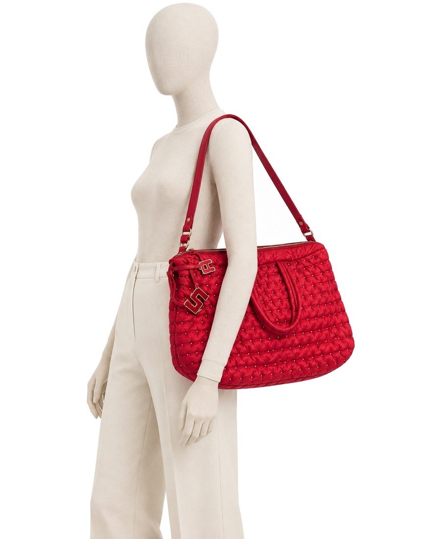 Sonia Rykiel red tote on a mannequin
