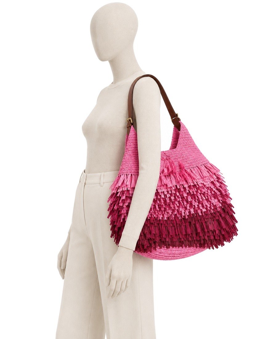 Anya Hindmarch raffia bag on a mannequin