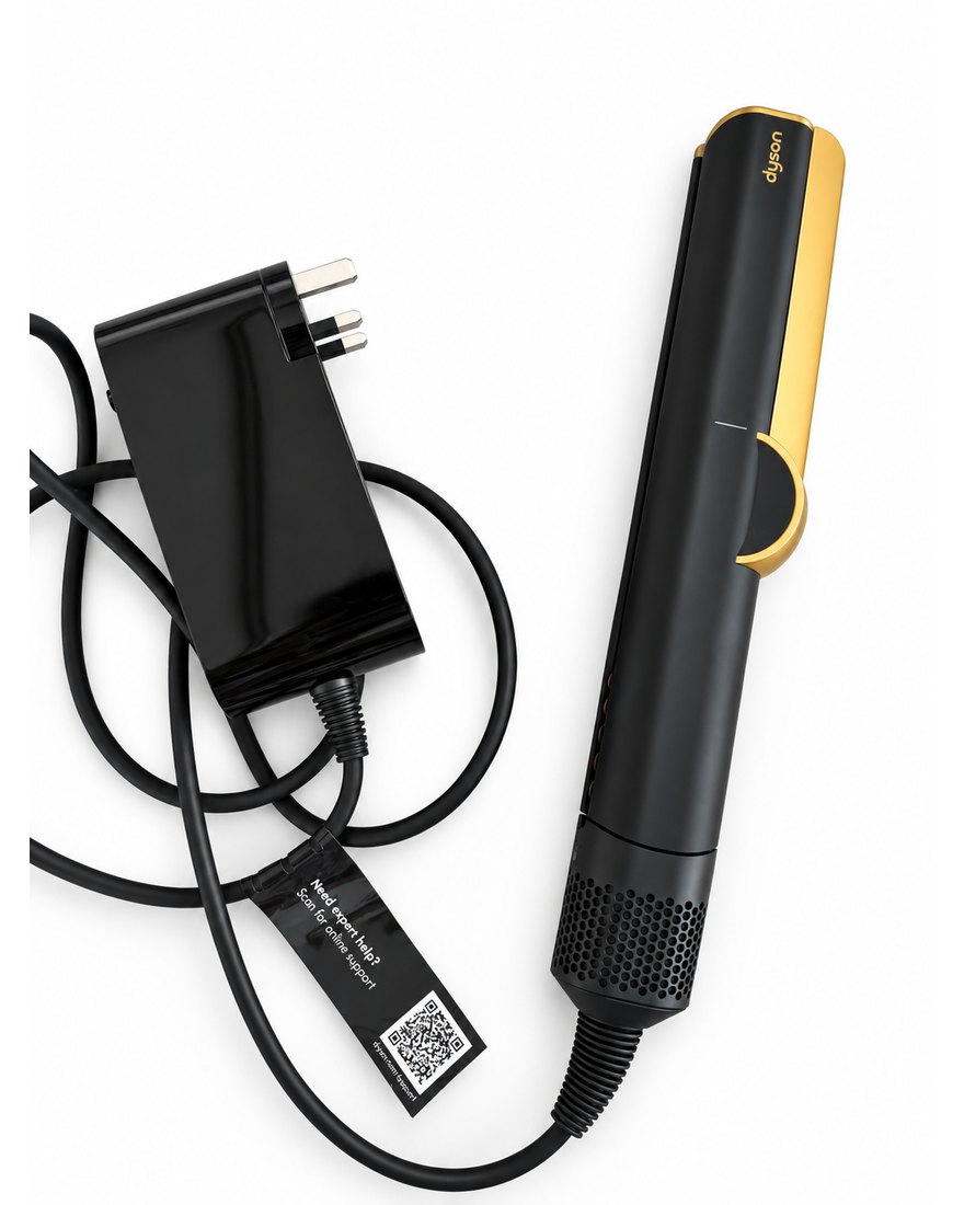 Dyson Airstrait straightener, onyx and gold, with charger